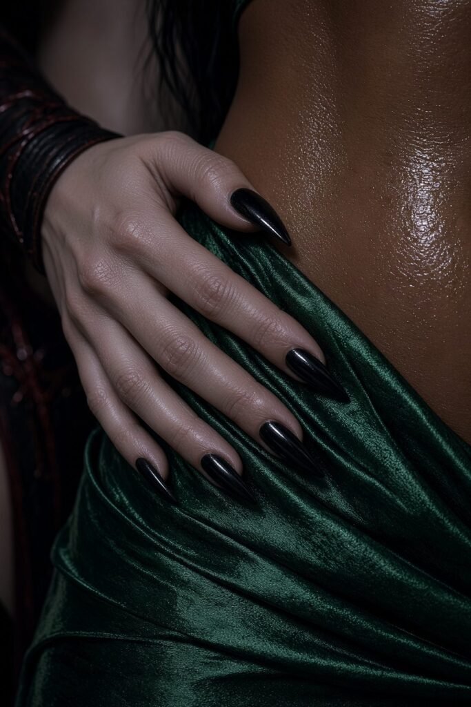 Elyndra's hand holding Veyra's hip over the soft green silk.